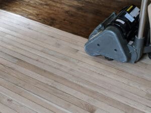 hardwood flooring being refinished.